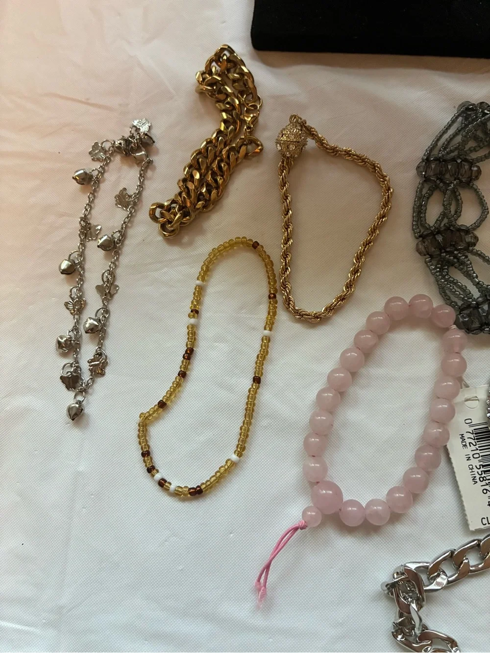 33 Vintage and modern bracelets. Some are stretchy and some aren’t.